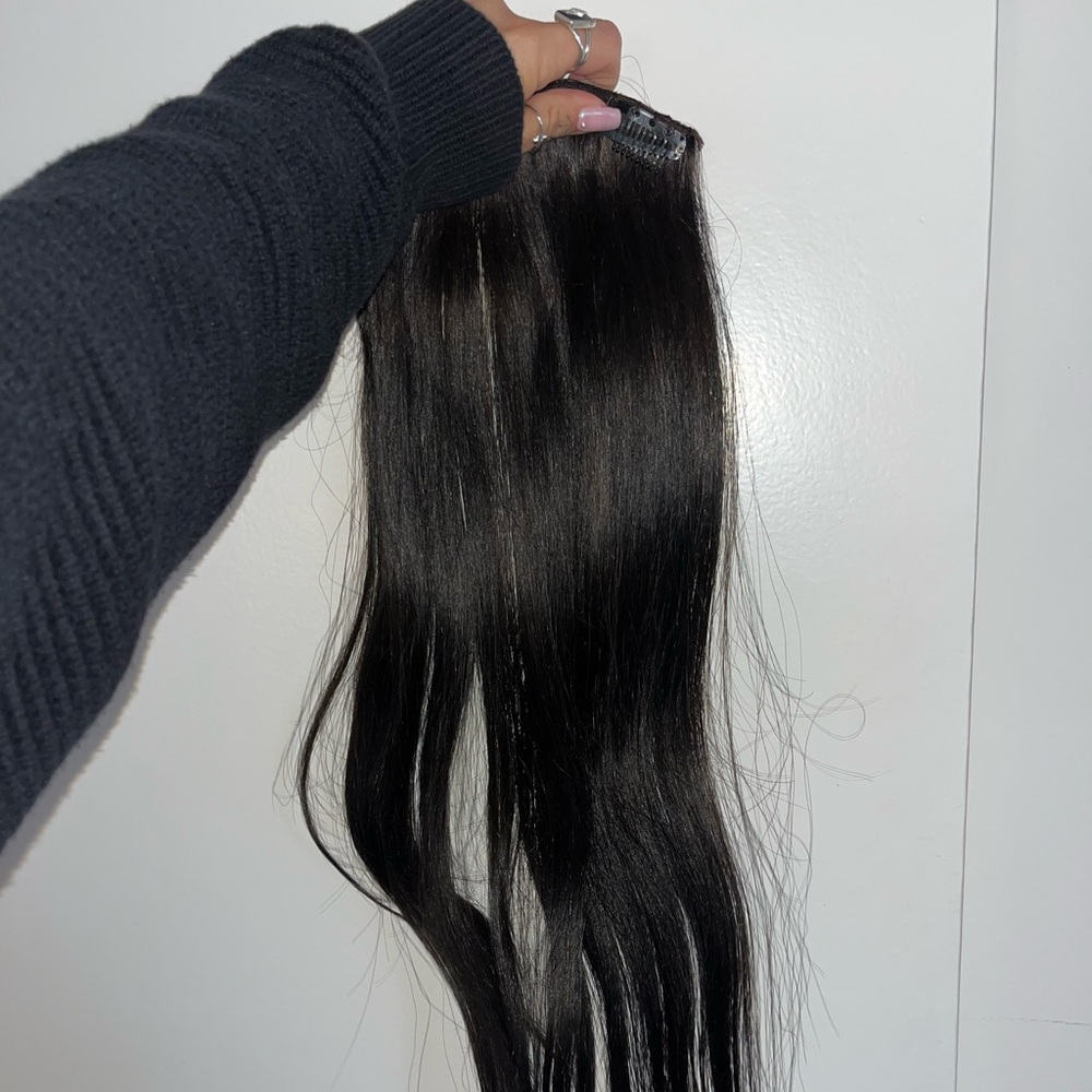 Two 22’ hand tied human hair extensions